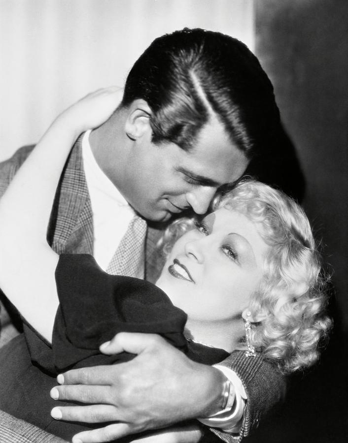 CARY GRANT and MAE WEST in IM NO ANGEL -1933-. Photograph by Album CARY GRANT and MAE WEST in IM NO ANGEL -1933-. Photograph by Album