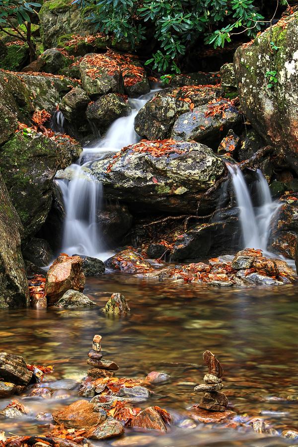 Cascades In Fall With Cairn Rocks Photograph