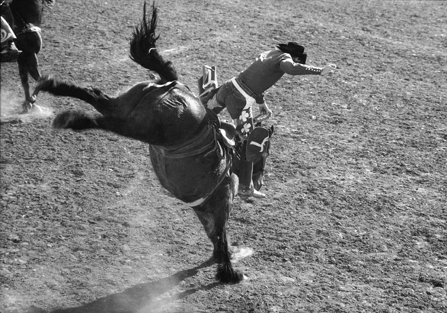 Casey Tibbs Rides A Bronco Photograph by Nat Farbman