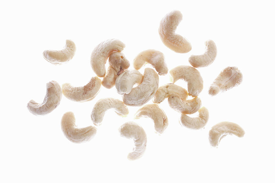 Cashew Nuts On A White Background Photograph by Petr Gross