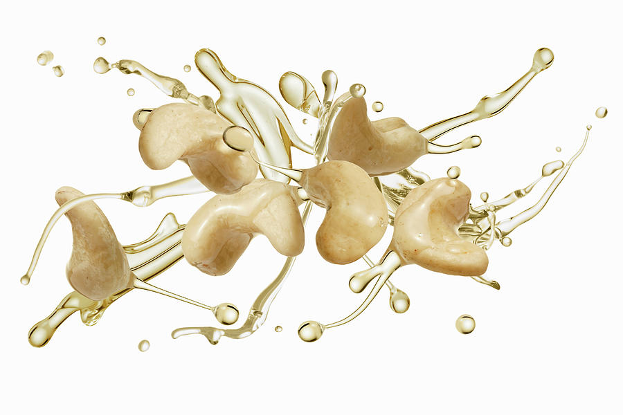Cashews With An Oil Splash Photograph by Krger & Gross