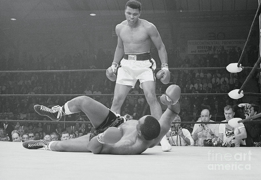 Sports Photograph - Cassius Clay And Sonny Liston by Bettmann