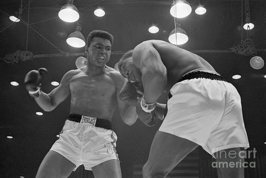 Cassius Clay Battles Sonny Liston Photograph by Bettmann