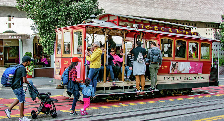 Catching a Ride in San Francisco Photograph by Marcy Wielfaert