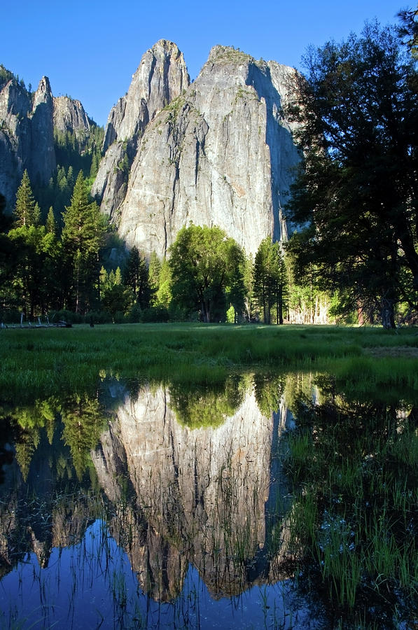 Cathedral Rocks Are Reflected In A Pool Photograph by Rachid Dahnoun