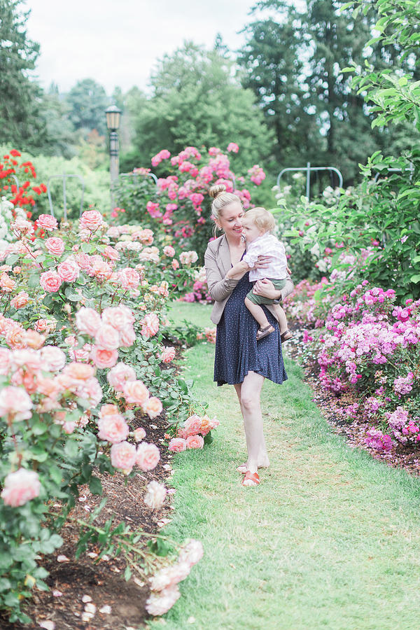 Portland Photograph - Caucasian 30-year Old Mother Holds Toddler Son In Rose Garden. by Cavan Images / Marie Elizabeth Photography