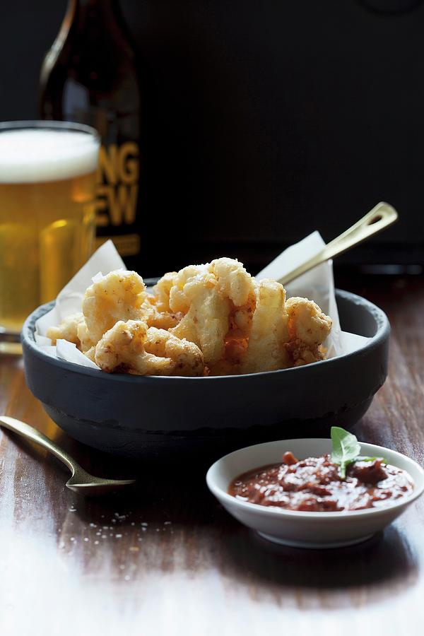 Cauliflower In Beer Batter With A Spicy Tomato Sauce Photograph by Great Stock!