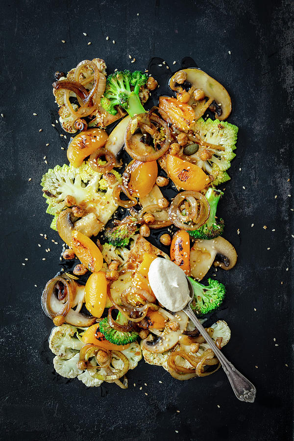 Cauliflower, Romanesco, Broccoli, Apricots, Mushrooms And Chickpeas, With Hummus As A Dip vegan Photograph by Jan Wischnewski