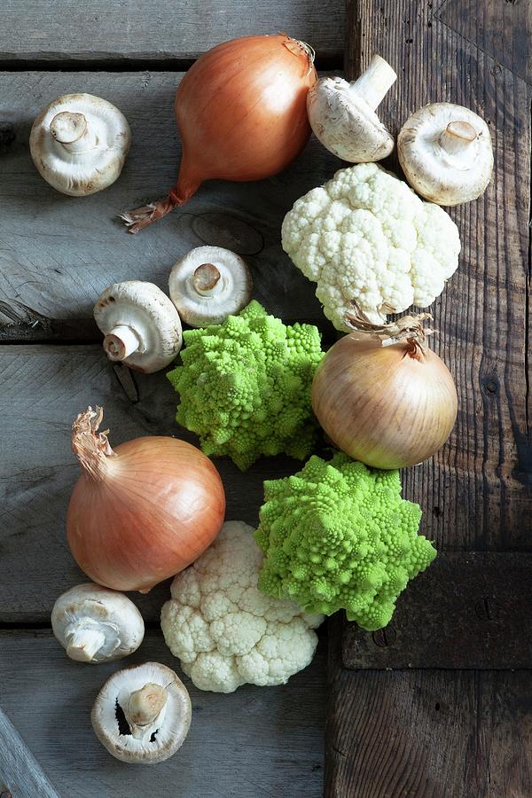 Cauliflower, Romanesco Broccoli, Onions And Mushrooms seen From Above Photograph by Victoria Firmston