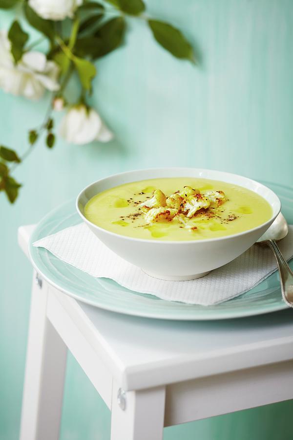 Cauliflower Soup With Cauliflower Florets And Spices Photograph by Charlotte Tolhurst