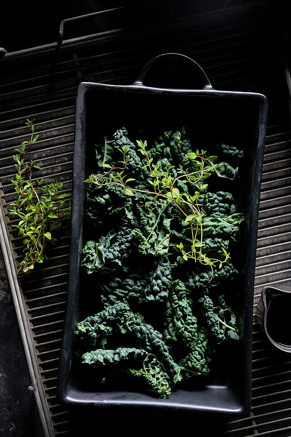 Cavalo Nero In Oven Dish With Thyme And Olive Oil Photograph by Arjan Smalen Photography