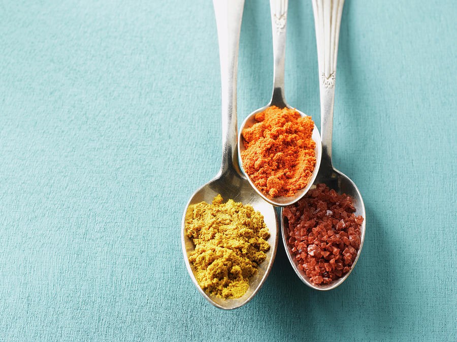 Cayenne Pepper, Curry Powder And Rock Photograph by Westend61