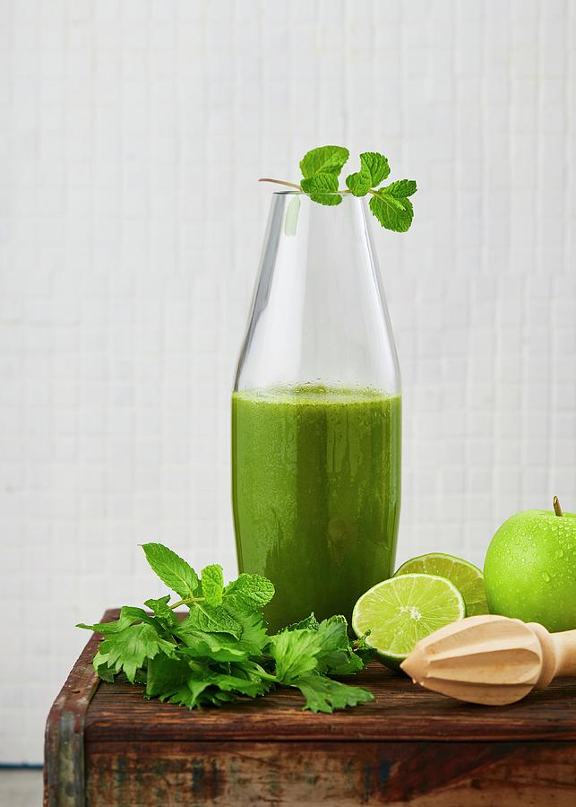 Celery, Apple And Spinach Juice With Lime And Ginger Photograph by Great Stock!