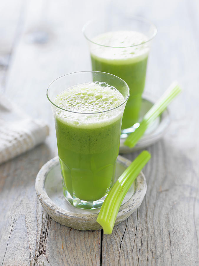 Celery, Ground-elder And Apple Smoothies Photograph by Andreas Thumm