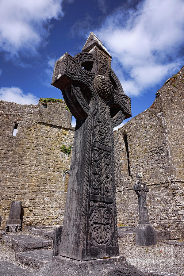 Celtic Cross and Irish Ruins Photograph by Olivier Le Queinec