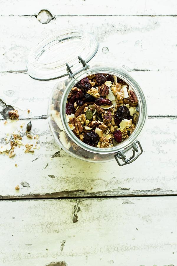 Cereal With Pecans, Pumpkin Seeds, Cranberries And Oat Flakes In A Glass Photograph by Dees Kche