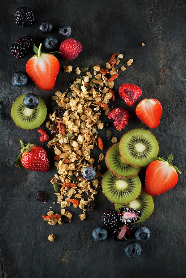 Cereals And Various Fruits Of Dark Surface Photograph by Komar