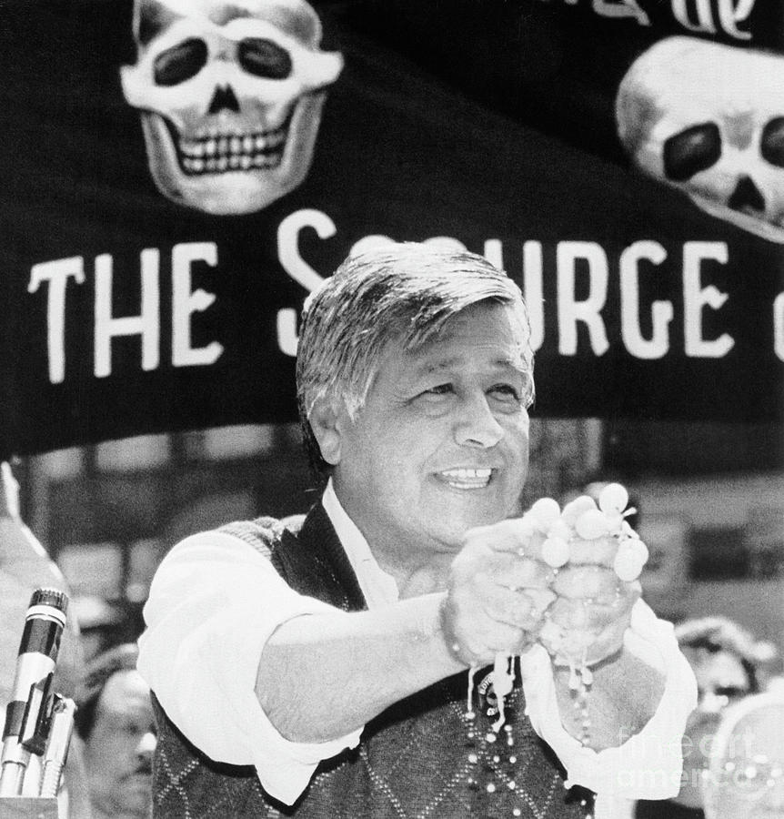 Cesar Chavez Squeezes Grapes In Rally Photograph by Bettmann