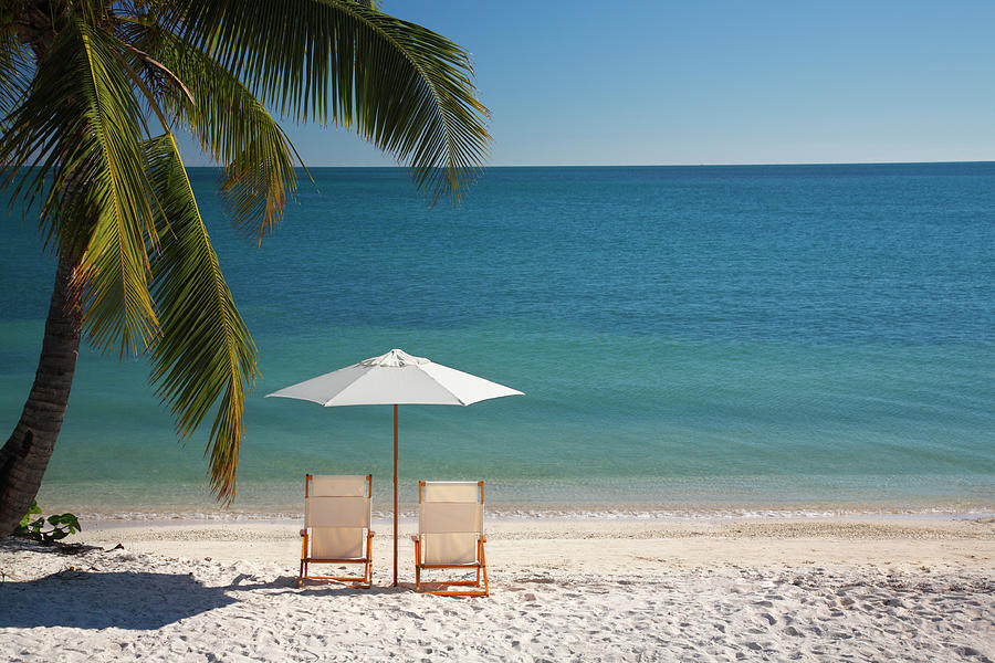 Chair On Florida Keys Beach Photograph by Cdwheatley