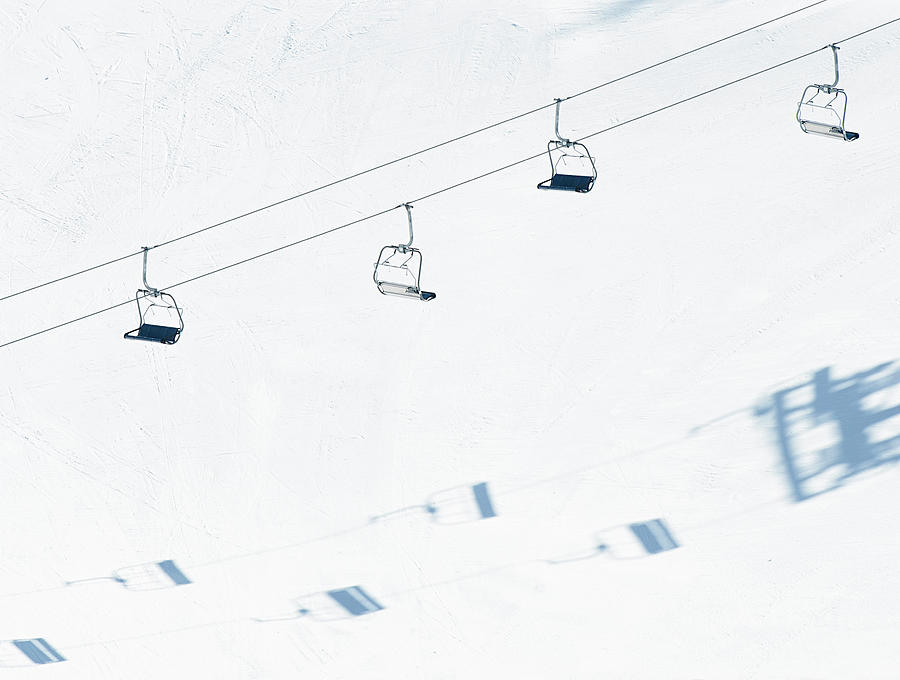 Chairlift And Ski Piste Photograph by Georgeclerk