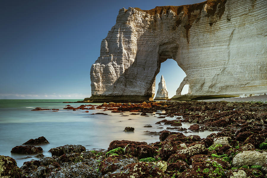 Chalk Cliffs Of Etretat With The Natural Arch Called Manneporte The Natural Arch Porte Daval And The Stone Needle Called Laiguille Photograph