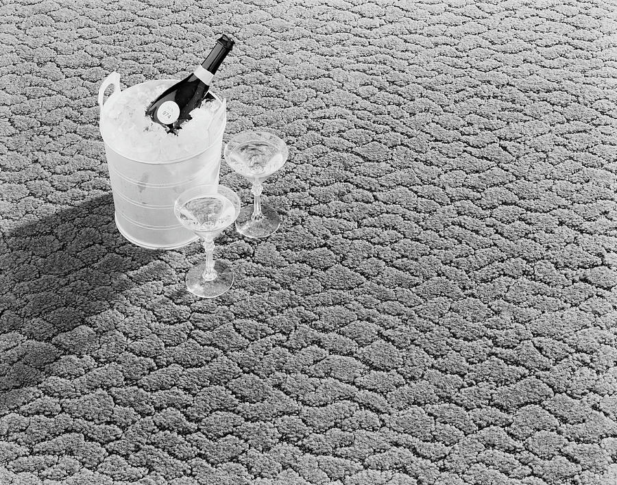 Champagne In Ice Bucket With Glasses Photograph by Tom Kelley Archive