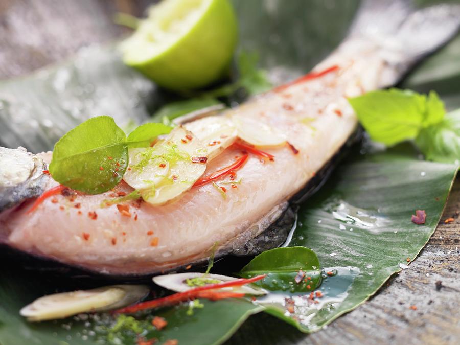 Char Fillet With Lemongrass And Ginger In A Banana Leaf Photograph by Eising Studio - Food Photo & Video