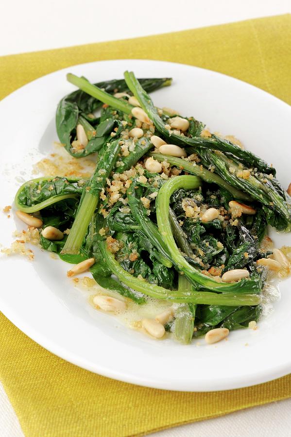 Chard Steamed In Butter With Pine Nuts And Crispy Breadcrumbs Photograph by Franco Pizzochero