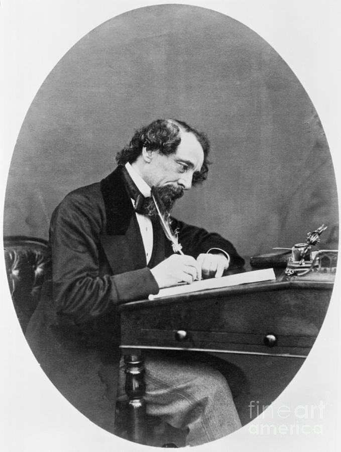 Charles Dickens Sitting At Desk Photograph by Bettmann