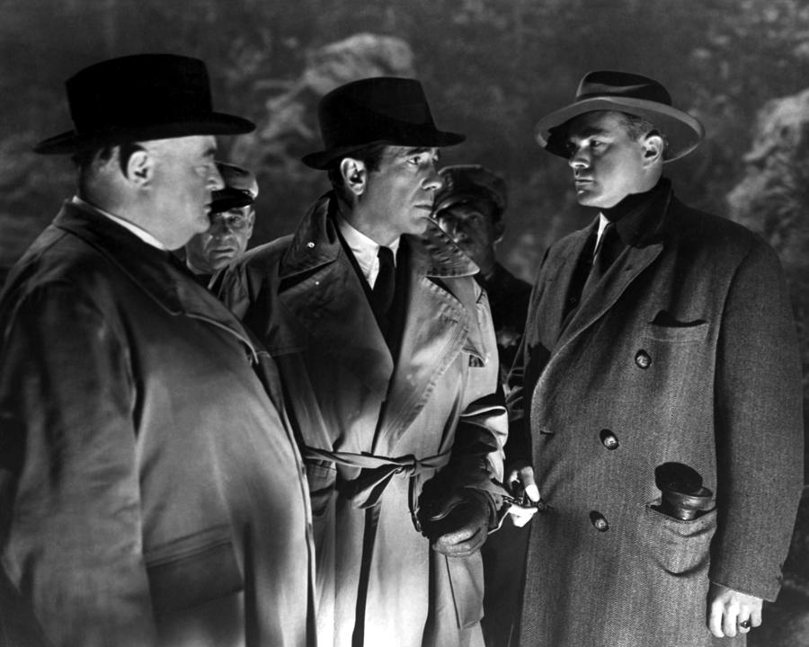 Humphrey Bogart Photograph - Charles Drake, Sydney Greenstreet And Humphrey Bogart Talking With Each Other by Globe Photos