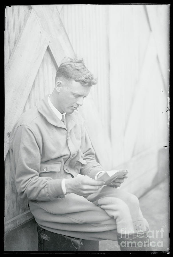 Charles Lindbergh Sitting And Reading Photograph by Bettmann