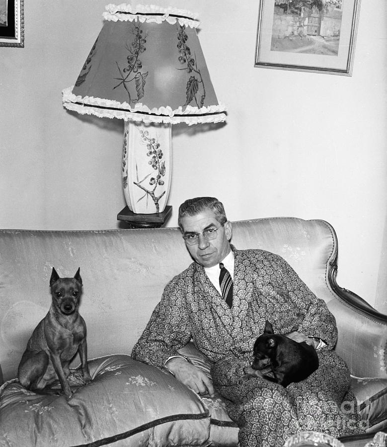 Charles Luciano On Couch With Pets Photograph by Bettmann