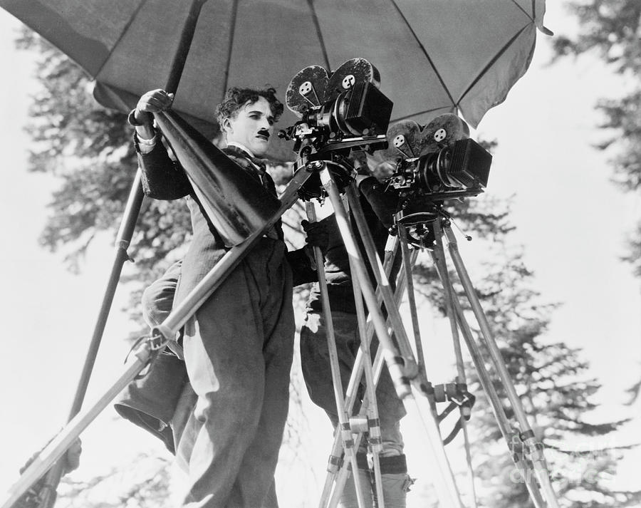 Charlie Chaplin And Movie Cameras Photograph by Bettmann