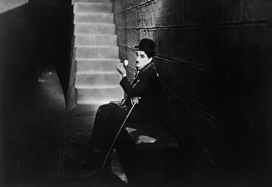 CHARLIE CHAPLIN in CITY LIGHTS -1931-. Photograph by Album