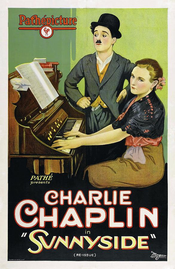 CHARLIE CHAPLIN in SUNNYSIDE -1919-. Photograph by Album