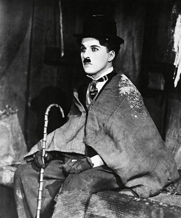 CHARLIE CHAPLIN in THE GOLD RUSH -1925-. Photograph by Album