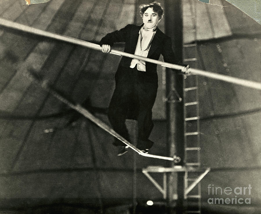 Charlie Chaplin On A Tightrope Photograph by Bettmann