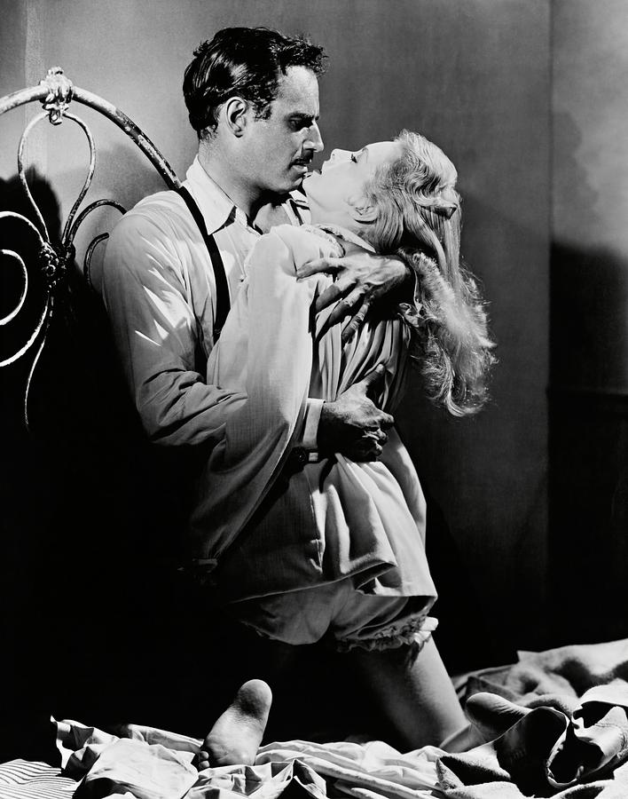 CHARLTON HESTON and JANET LEIGH in TOUCH OF EVIL -1958-. Photograph by Album