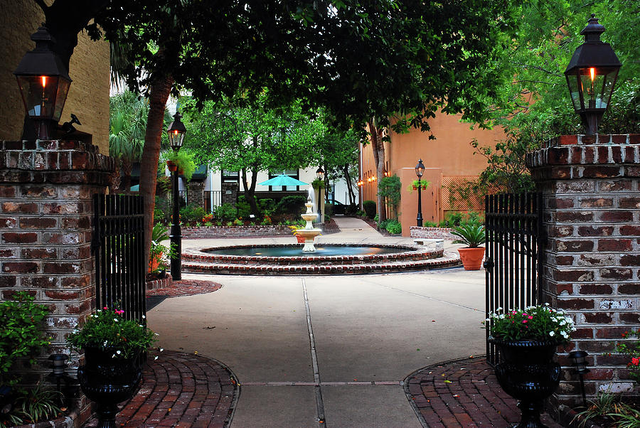 Charming courtyard, Charleston Photograph by James Kirkikis