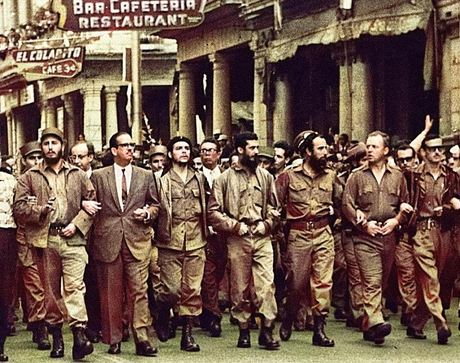 Che Guevara  third from left  and Fidel Castro  far left marching to Colon Cemetery. colorized by A Painting by Celestial Images