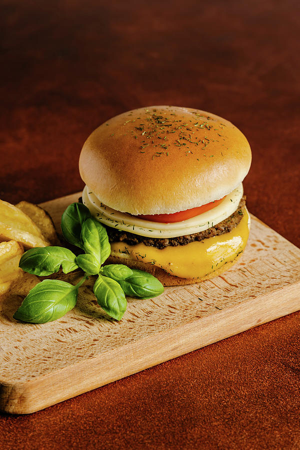 Cheese And Beef Burger With Mustard Barbecue Sauce And French Fries Photograph by Alla Machutt