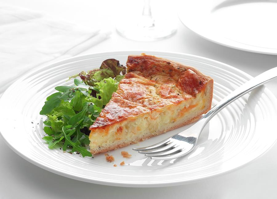 Cheese And Chive Quiche With A Rocket Salad Photograph by Robert Morris