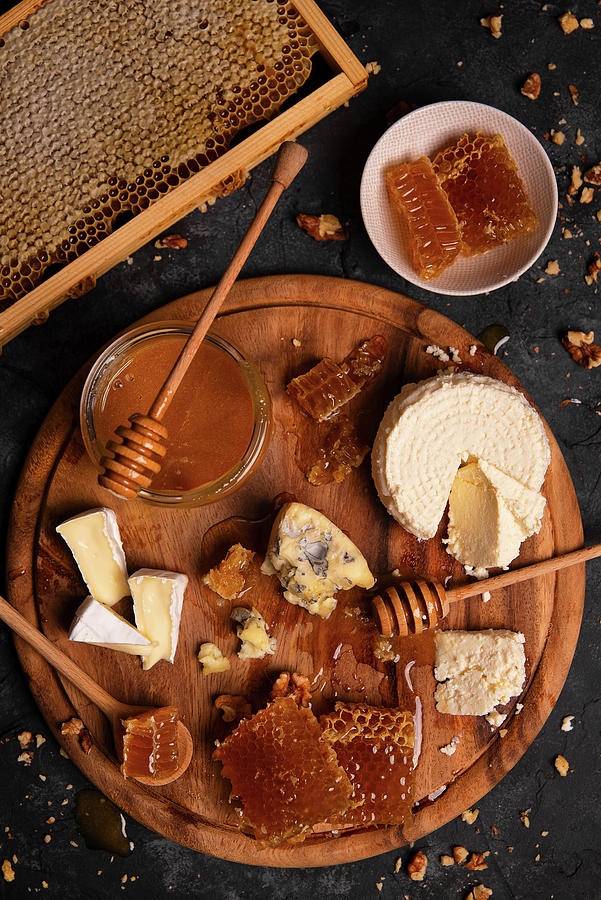 Cheese Board With Ricotta, Camembert, Blue Cheese, Nuts And Honey Photograph by Karolina Polkowska
