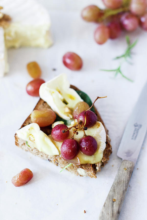 Cheese Bread With Camembert And Red Grapes Photograph by Annalena Bokmeier