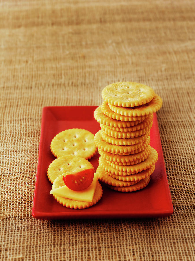 Cheese Crackers With Tomatoes And Cheese Photograph by Frank Adam