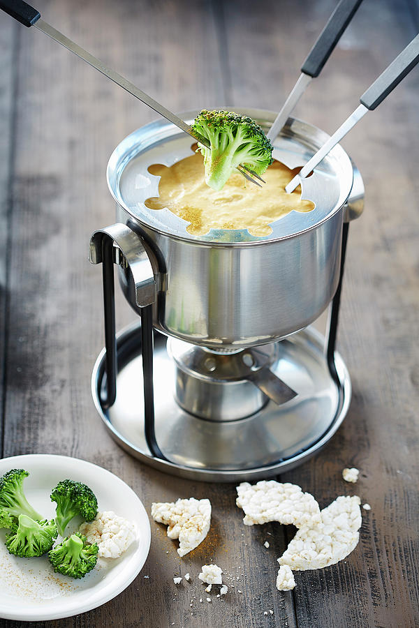 Cheese Curry Fondue With Broccoli Photograph by Rafael Pranschke