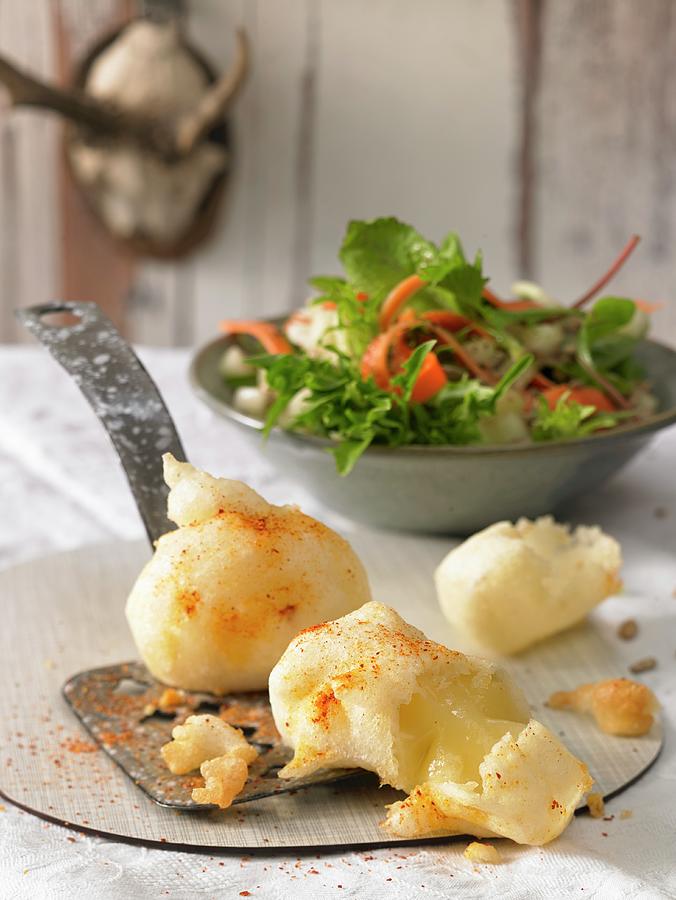 Cheese Doughnuts With A Green Salad Photograph by Jan-peter Westermann