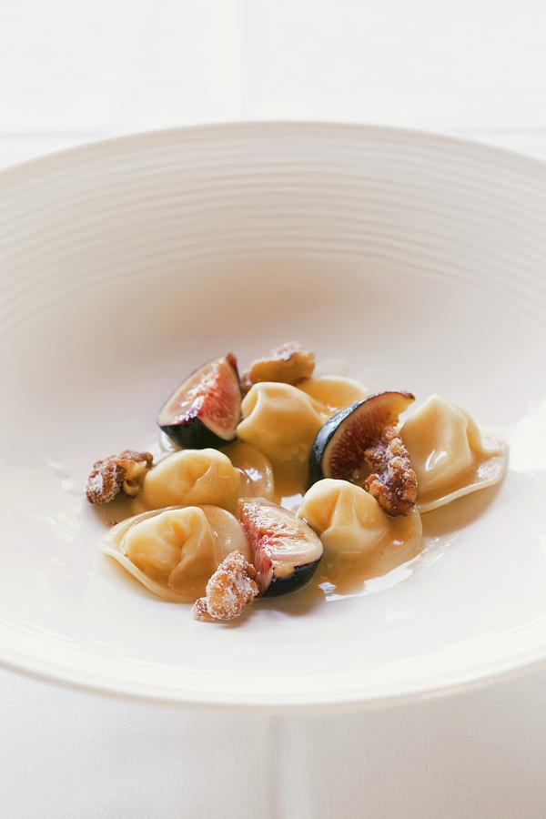 Cheese Ravioli With A Fig And Candied Walnut Sauce Photograph by Jennifer Martine