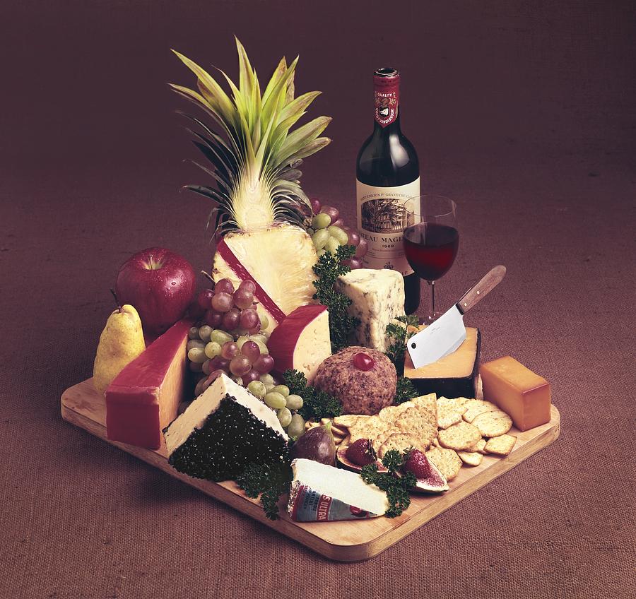 Cheese Tray With Wine Photograph by Tom Kelley Archive
