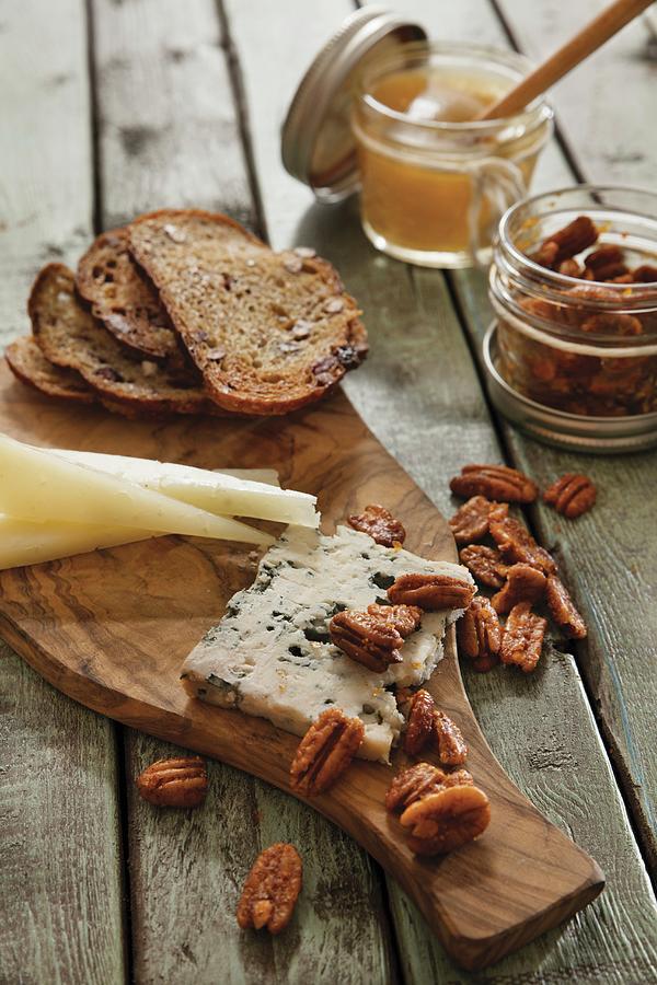 Cheese With Grilled Bread And Roasted Pecan Nuts Photograph by Cindy Haigwood
